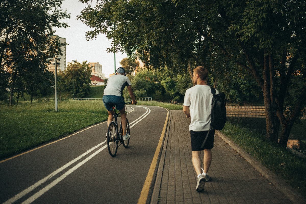 Bicyclist and pedestrian on local paths